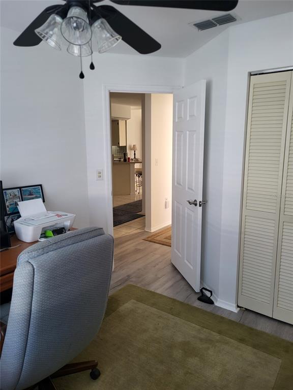 482 Pendleton Place Venice, FL 34292 - Photo 23 of 54 a living room with furniture and a window