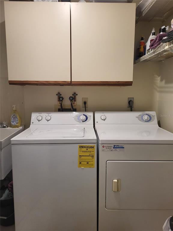 482 Pendleton Place Venice, FL 34292 - Photo 40 of 54 a utility room with dryer and washer