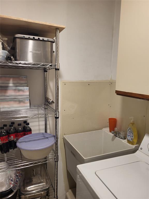 482 Pendleton Place Venice, FL 34292 - Photo 41 of 54 a bathroom with a sink and wooden floor