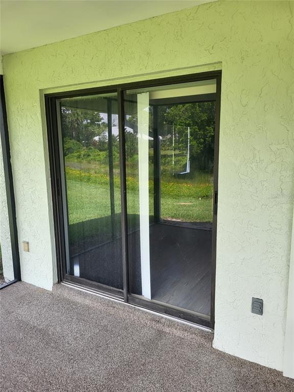 482 Pendleton Place Venice, FL 34292 - Photo 43 of 54 a view of a glass door of the house