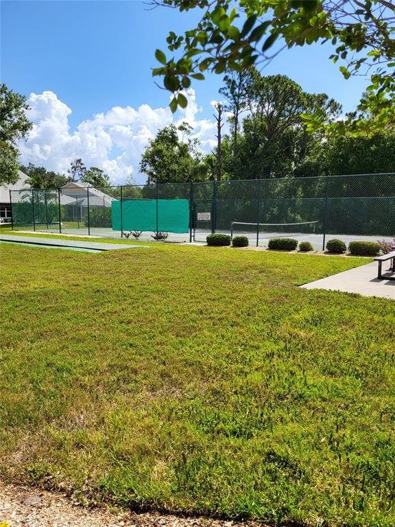 482 Pendleton Place Venice, FL 34292 - Photo 54 of 54 a view of a swimming pool with a yard