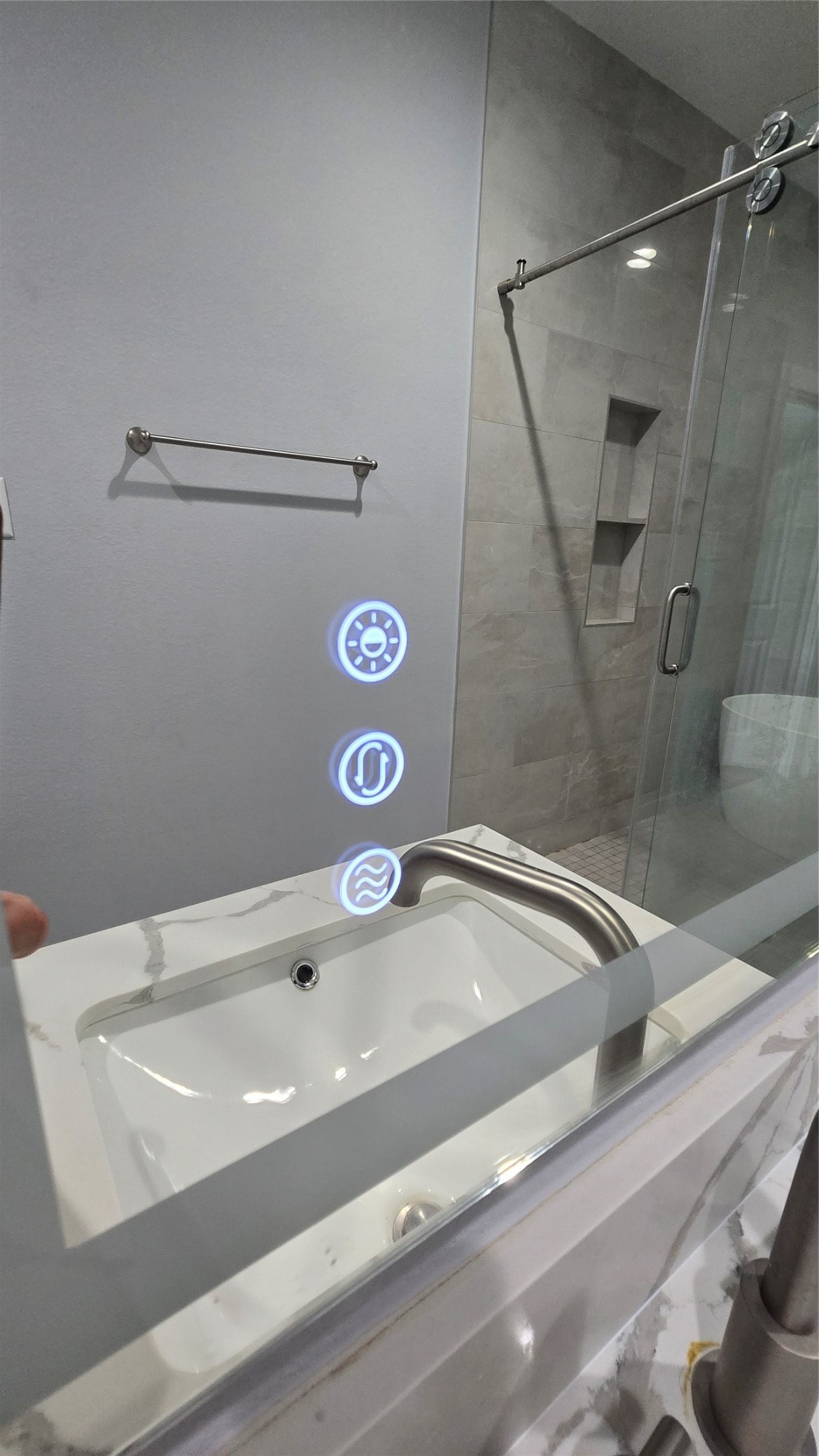 10017 Morocco Road Houston, TX 77041 - Photo 19 of 24 a bathroom with a sink and a mirror