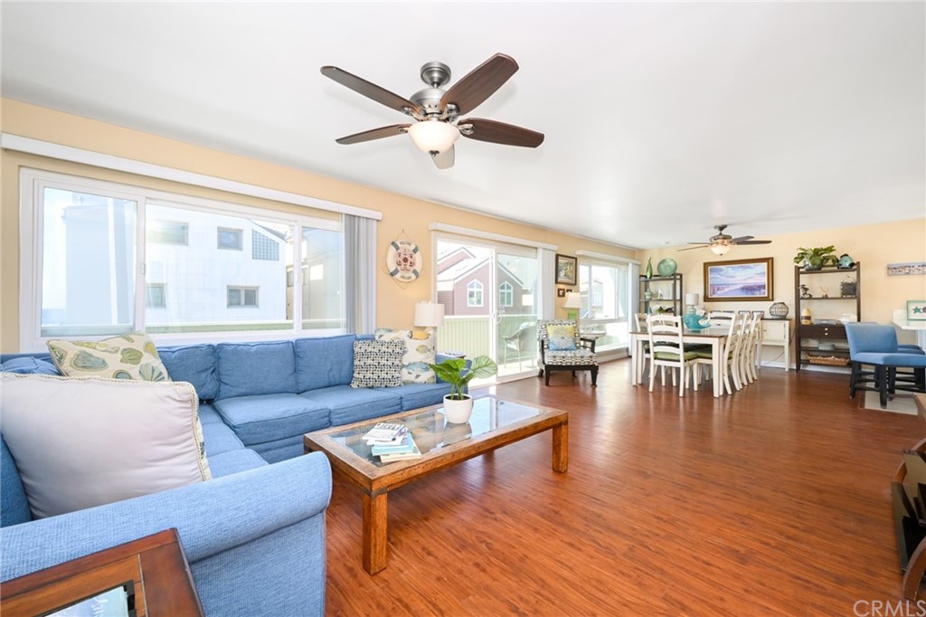 5100 Seashore Drive Newport Beach, CA 92663 - Photo 3 of 67 a living room with furniture and a large window