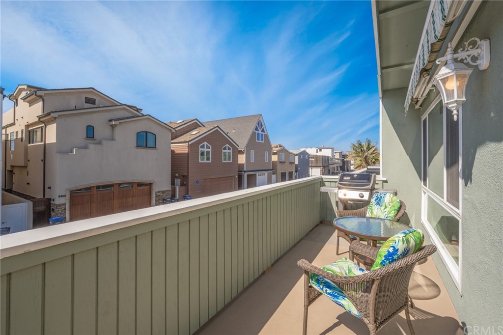5100 Seashore Drive Newport Beach, CA 92663 - Photo 38 of 67 a view of a balcony with chairs