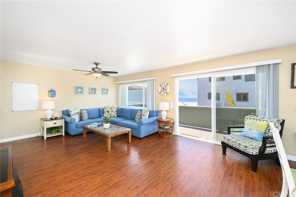 5100 Seashore Drive Newport Beach, CA 92663 - Photo 4 of 67 a living room with furniture and a wooden floor