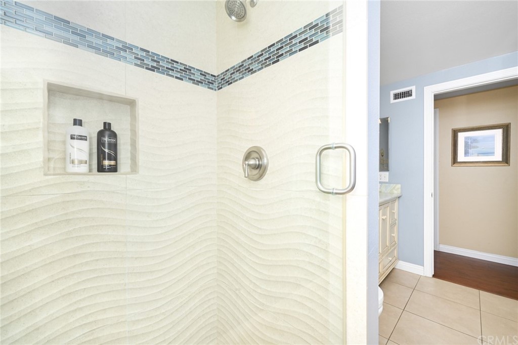 5100 Seashore Drive Newport Beach, CA 92663 - Photo 45 of 67 a bathroom with a shower