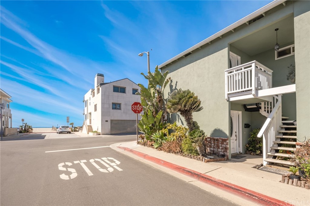 5100 Seashore Drive Newport Beach, CA 92663 - Photo 58 of 67 a front view of a building with street view