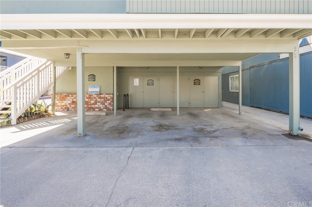 5100 Seashore Drive Newport Beach, CA 92663 - Photo 62 of 67 a view of a porch with a table and chair