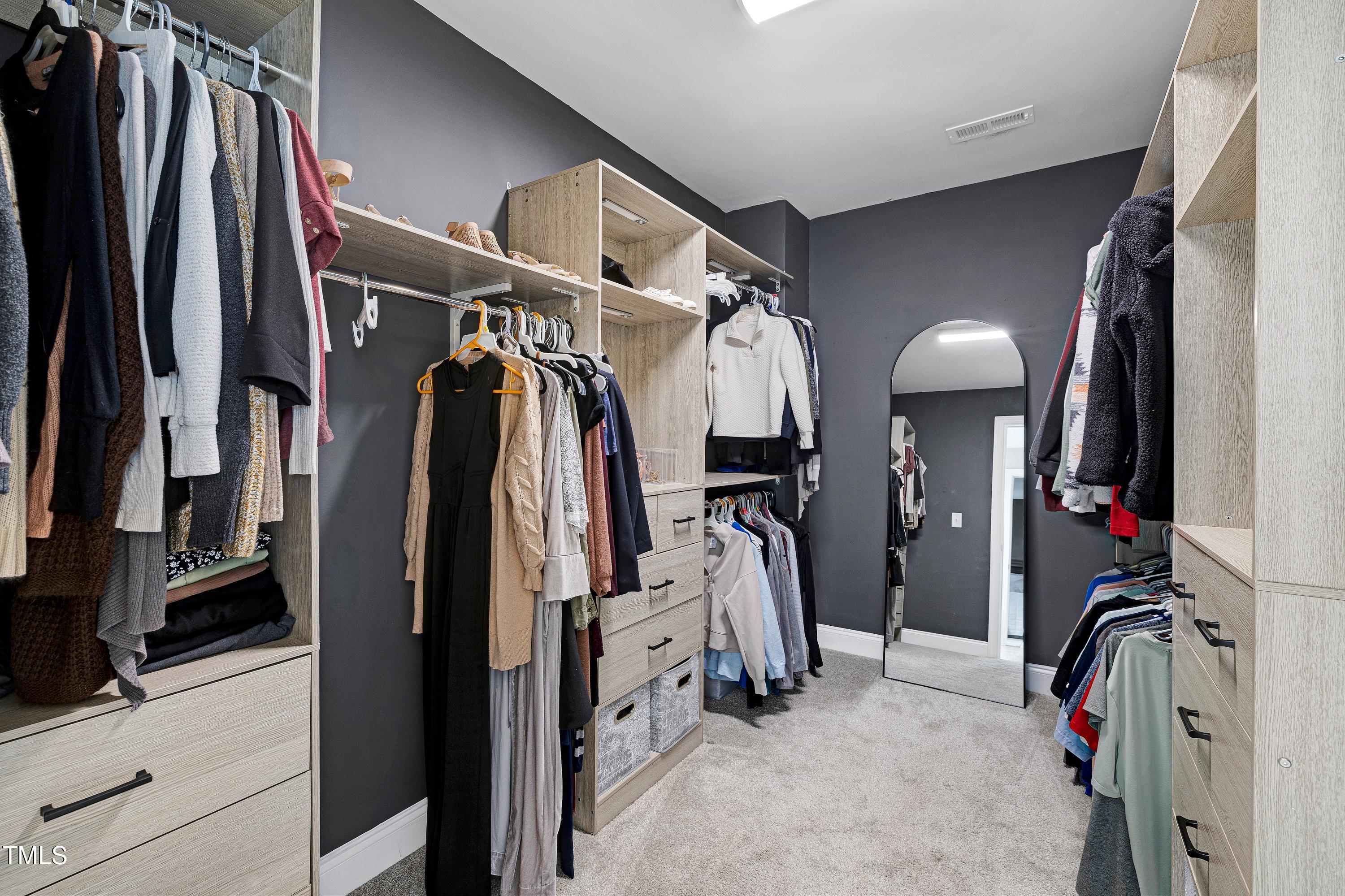 1417 Slate Ridge Road Knightdale, NC 27545 - Photo 28 of 66 a view of a closet with storage