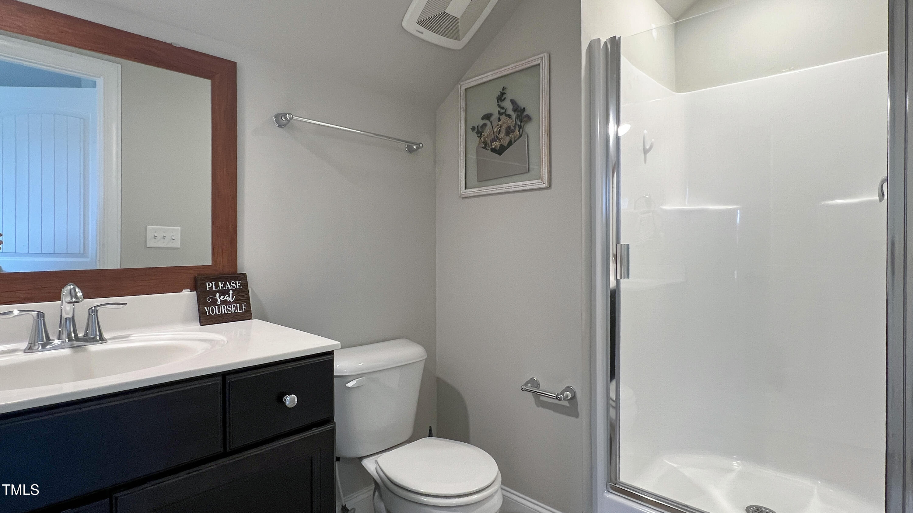 1417 Slate Ridge Road Knightdale, NC 27545 - Photo 41 of 66 a bathroom with a sink toilet and shower