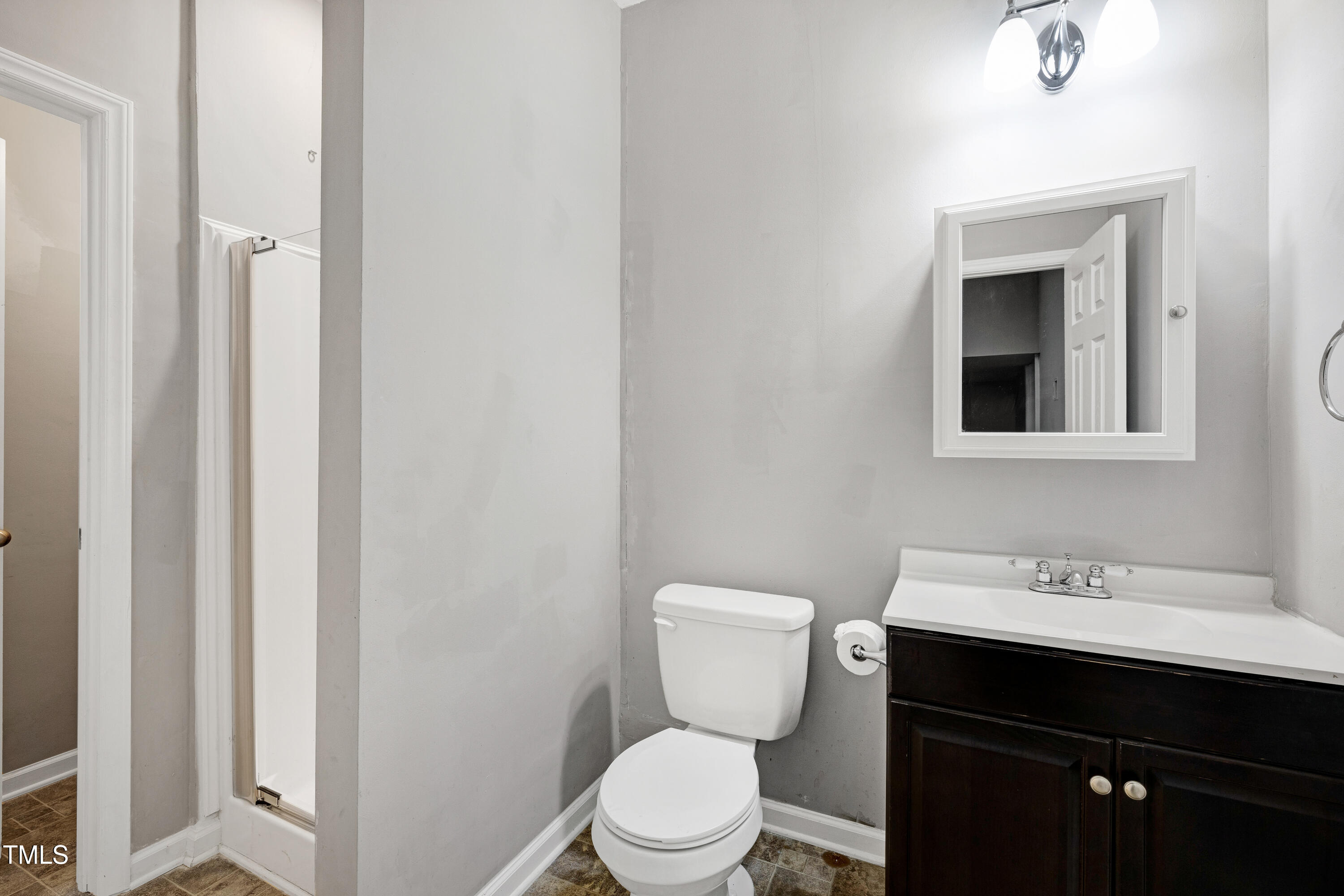 1417 Slate Ridge Road Knightdale, NC 27545 - Photo 42 of 66 a bathroom with a sink and a toilet