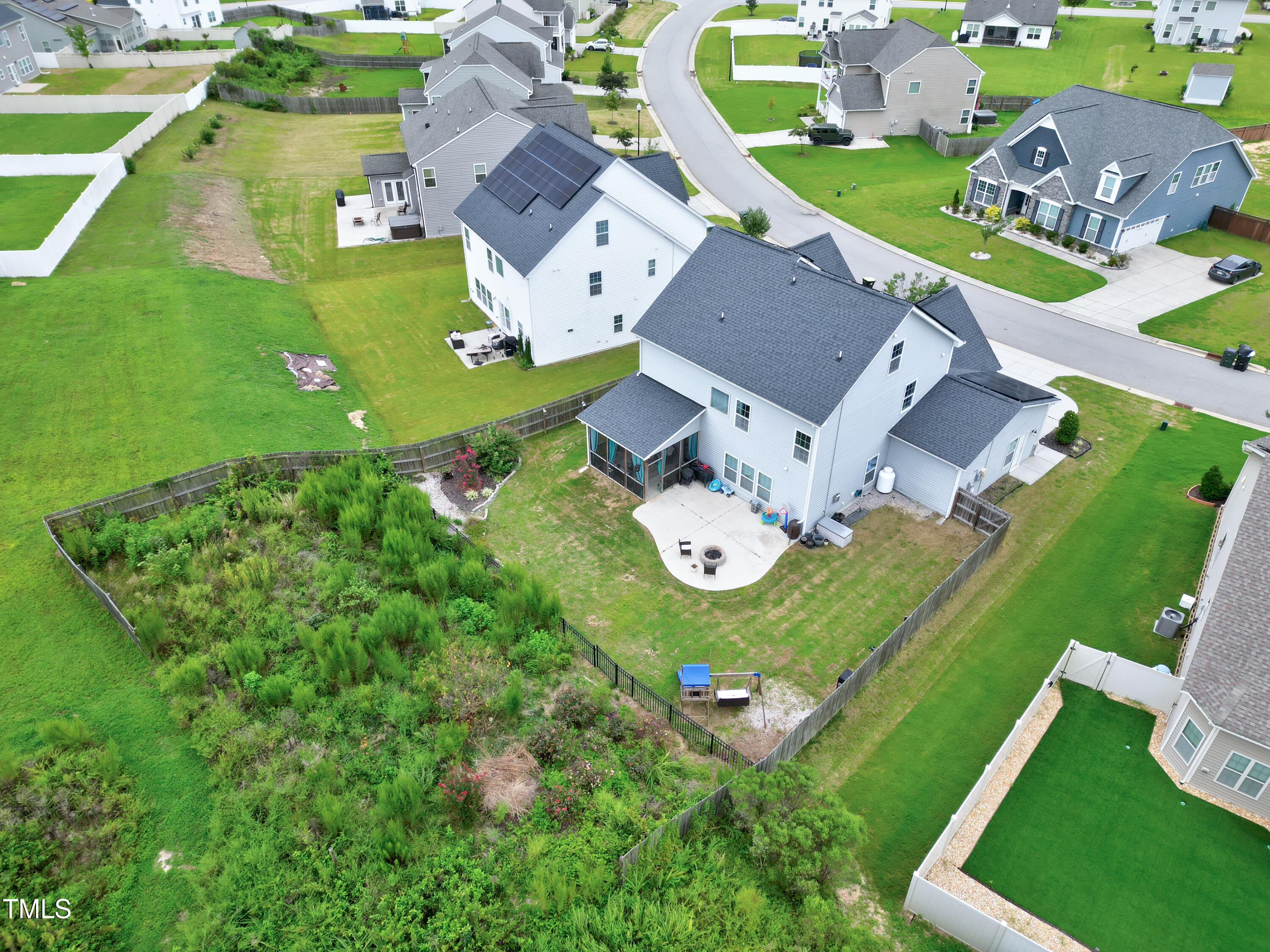 1417 Slate Ridge Road Knightdale, NC 27545 - Photo 55 of 66 an aerial view of a house with a garden