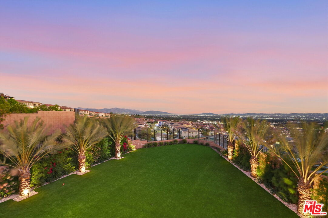 20448 Liverpool Way Porter Ranch, CA 91326 - Photo 3 of 61 a view of a lake with outdoor space