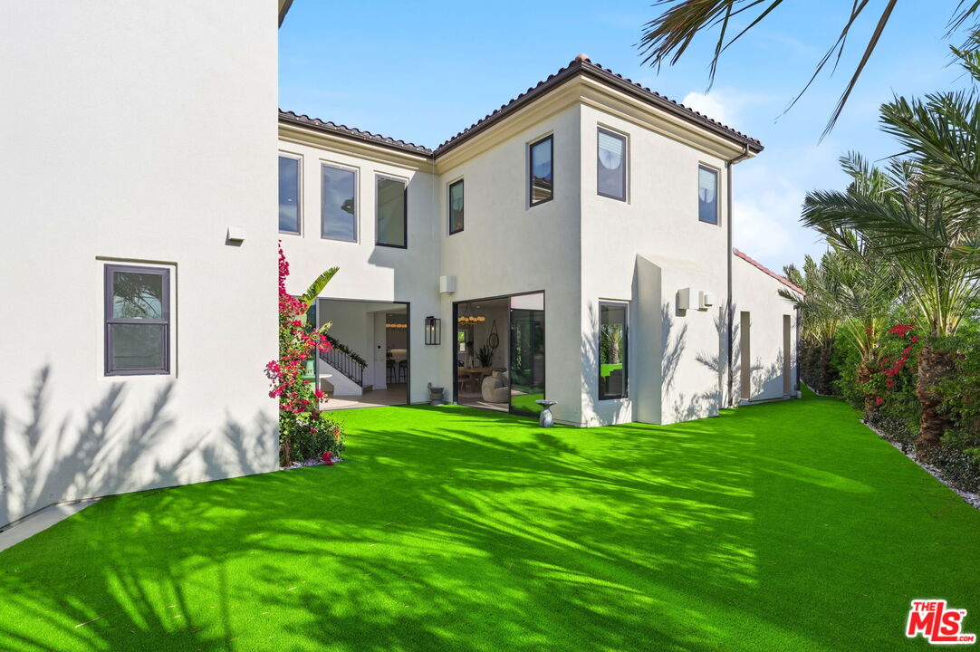 20448 Liverpool Way Porter Ranch, CA 91326 - Photo 52 of 61 a view of a house with backyard
