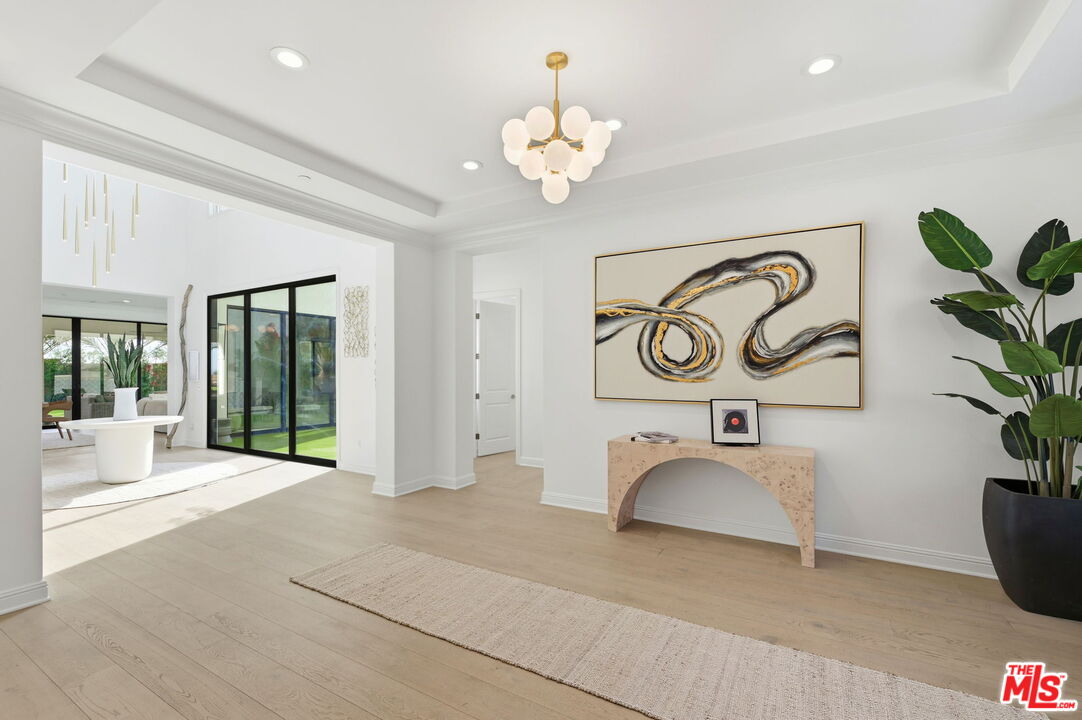 20448 Liverpool Way Porter Ranch, CA 91326 - Photo 7 of 61 a view of a hallway with window