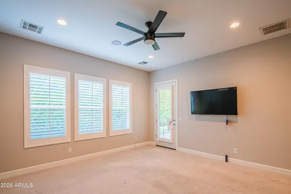a kitchen with cabinets and window