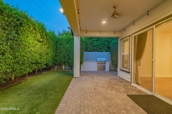 a view of a porch with wooden floor and outdoor space