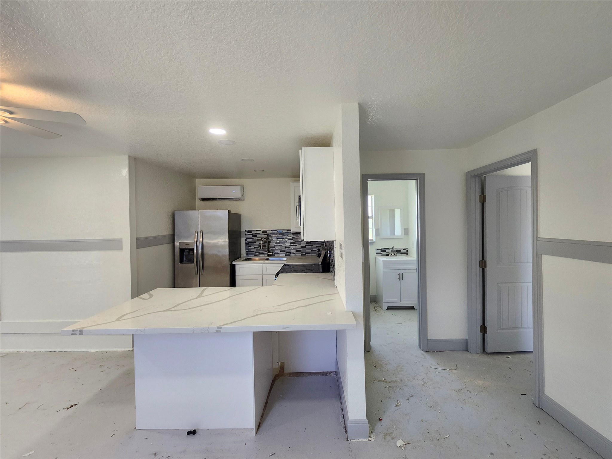 515 Thunder Road Surfside Beach, TX 77541 - Photo 3 of 31 Step into a spacious, open-concept kitchen and living area.