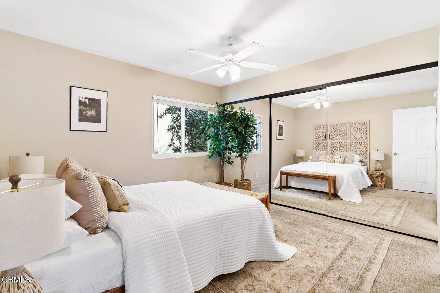 4828 Hollow Corner Road, Unit 293 Culver City, CA 90230 - Photo 13 of 24 a bedroom with a bed and a large mirror