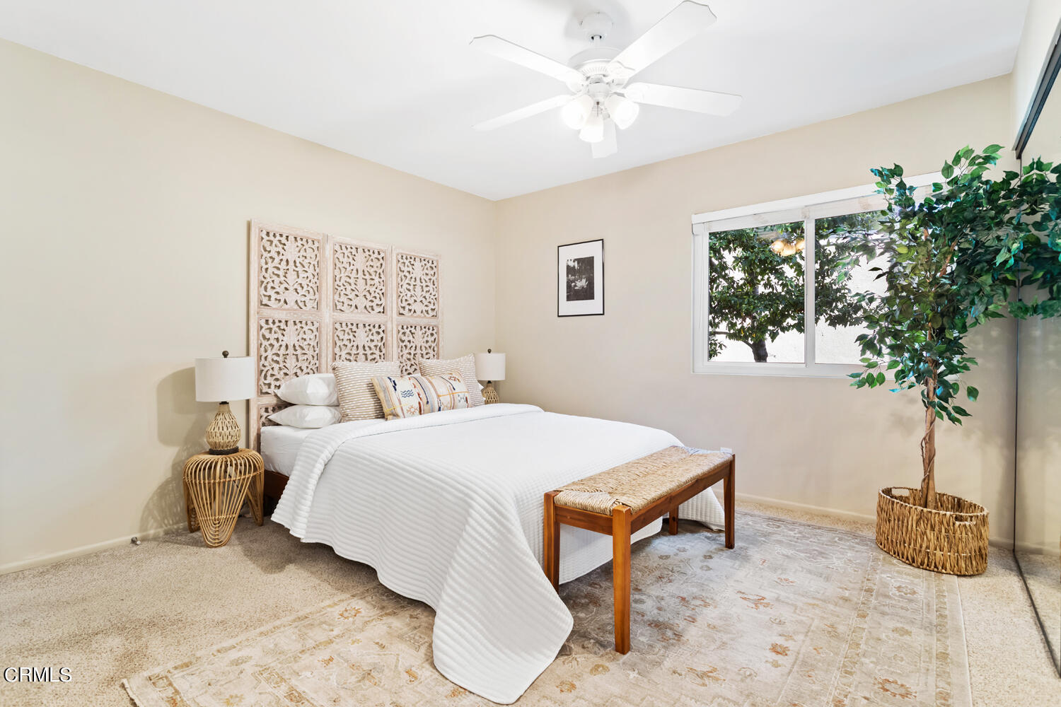 4828 Hollow Corner Road, Unit 293 Culver City, CA 90230 - Photo 15 of 24 a bedroom with a bed and a chandelier