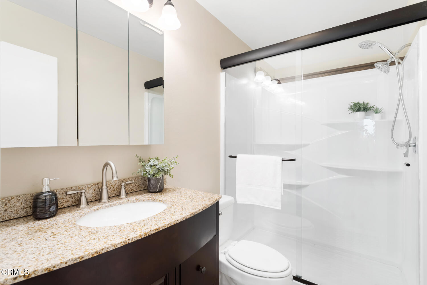 4828 Hollow Corner Road, Unit 293 Culver City, CA 90230 - Photo 16 of 24 a bathroom with a granite countertop sink toilet and shower