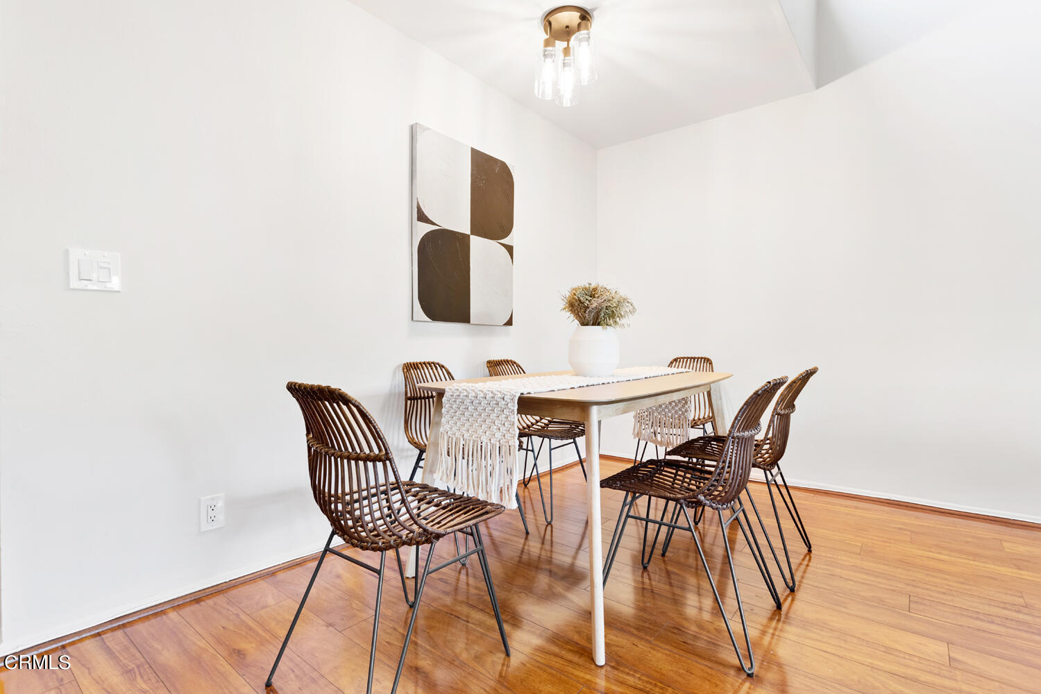 4828 Hollow Corner Road, Unit 293 Culver City, CA 90230 - Photo 5 of 24 a view of a dining room with furniture and wooden floor