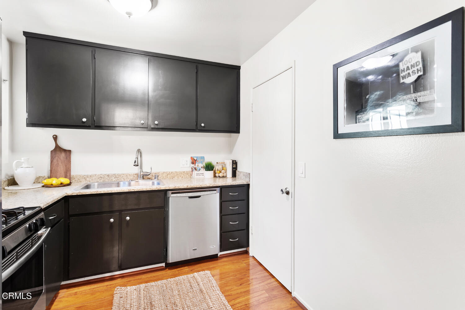 4828 Hollow Corner Road, Unit 293 Culver City, CA 90230 - Photo 10 of 24 a bathroom with a sink and a mirror