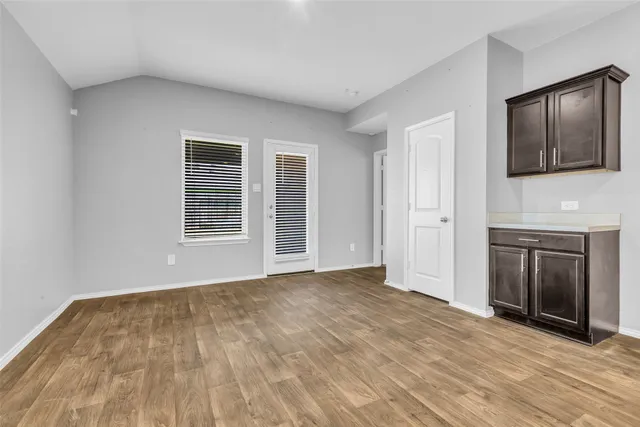 wooden floor and window in a room
