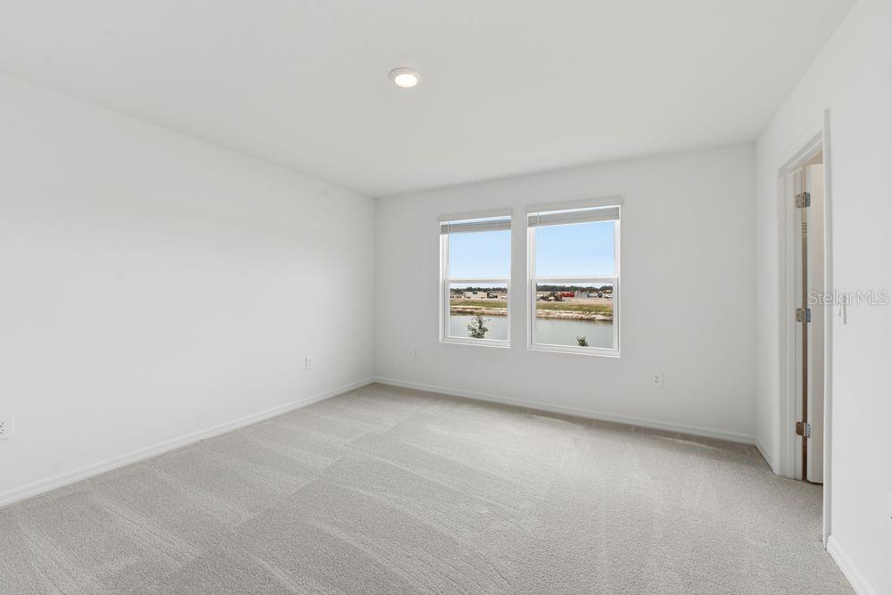 13235 Commons Avenue Parrish, FL 34219 - Photo 13 of 37 an empty room with a window