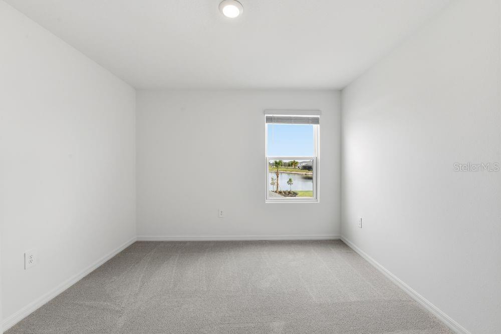 13235 Commons Avenue Parrish, FL 34219 - Photo 19 of 37 an empty room with a window
