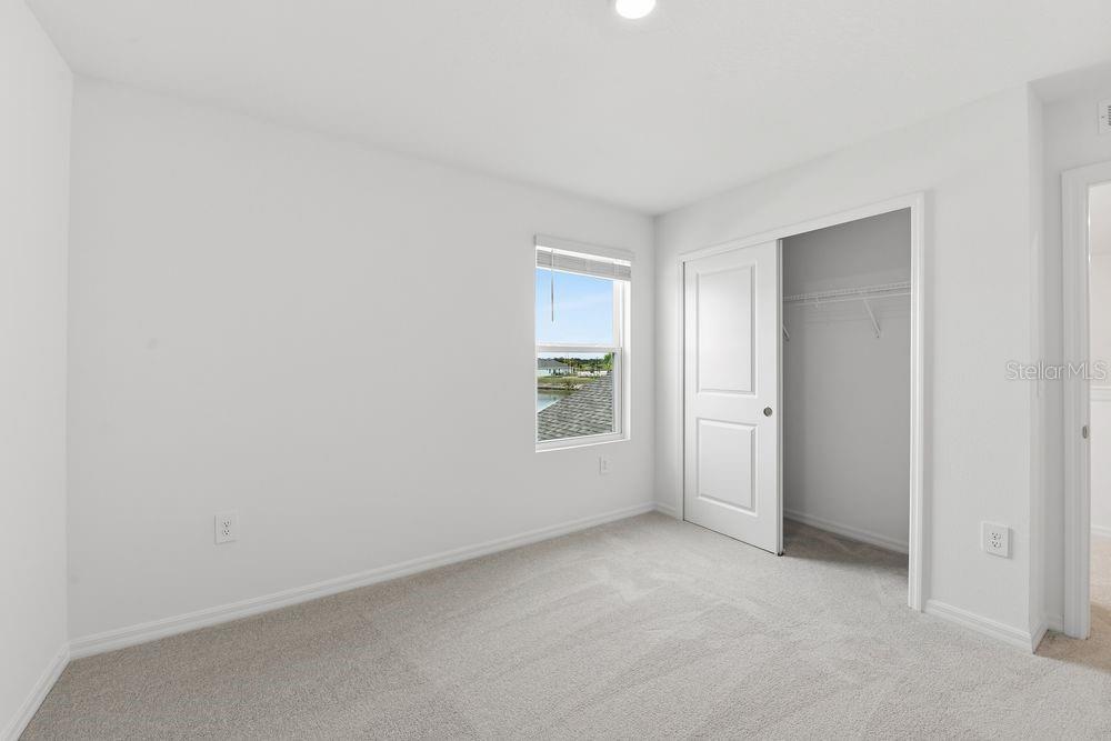 13235 Commons Avenue Parrish, FL 34219 - Photo 24 of 37 a view of an empty room with a window