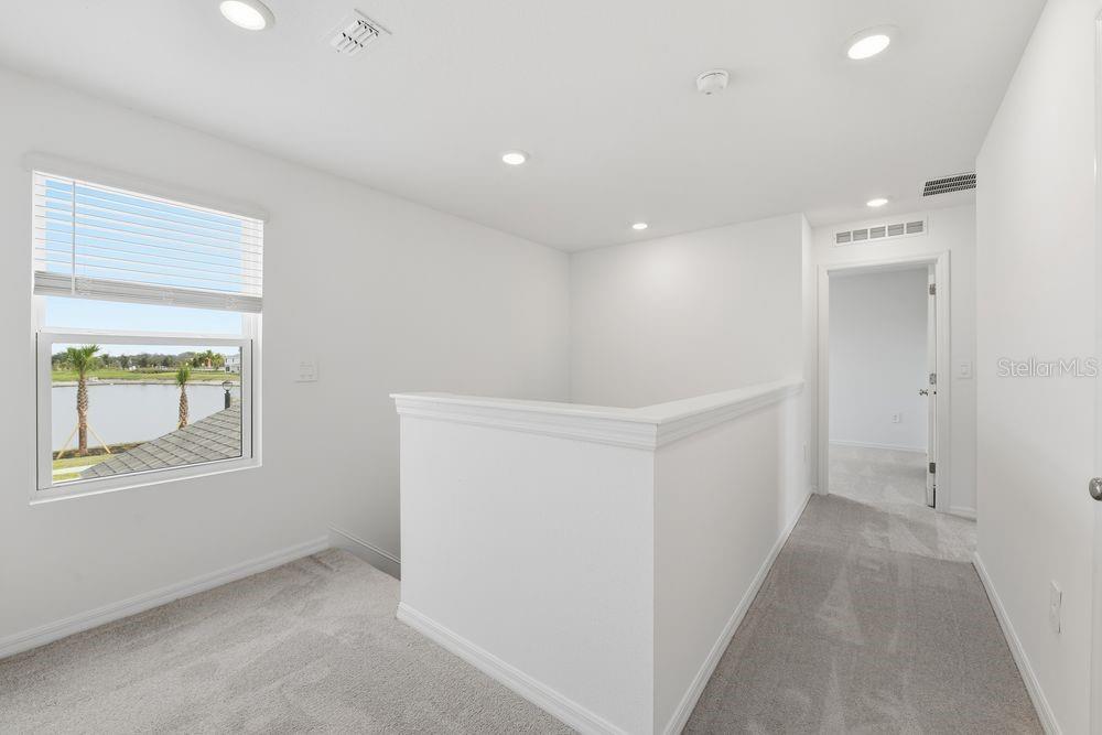 13235 Commons Avenue Parrish, FL 34219 - Photo 26 of 37 a view of hallway with window and hallway