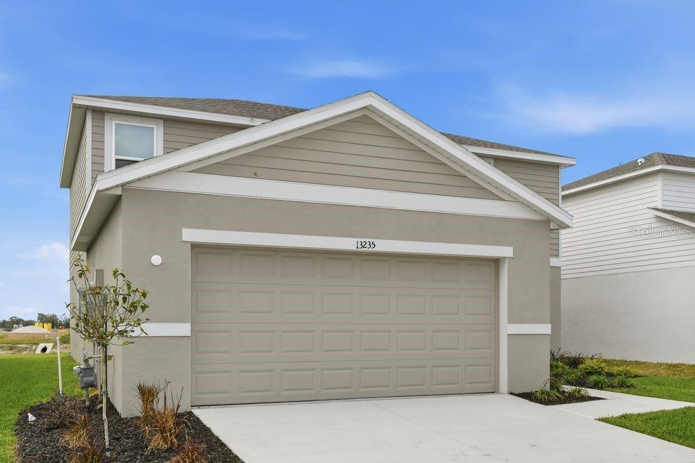 13235 Commons Avenue Parrish, FL 34219 - Photo 31 of 37 a view of backyard of the house