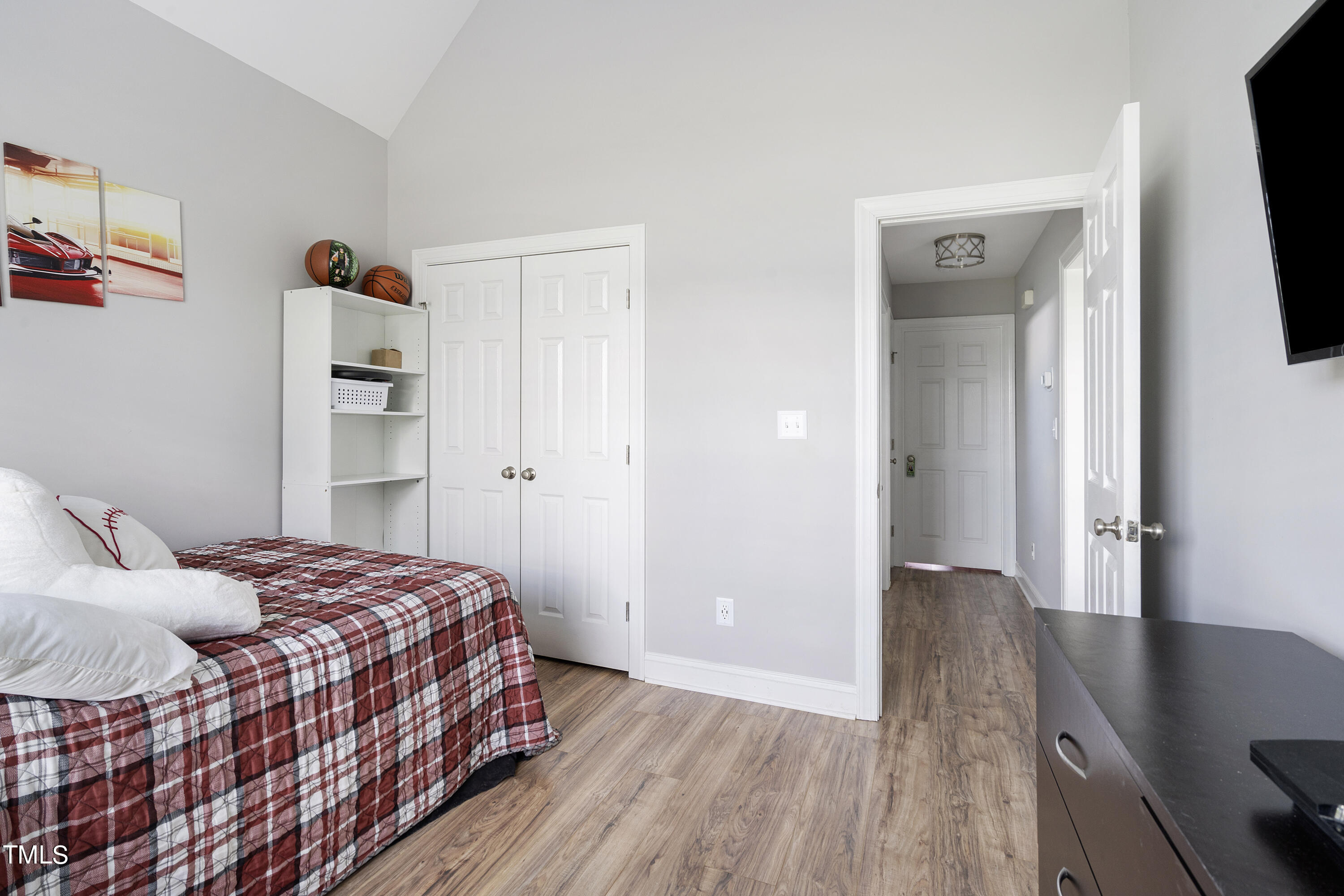 6910 Rock Ridge Sims Road Sims, NC 27880 - Photo 22 of 45 a bedroom with a bed and a flat screen tv