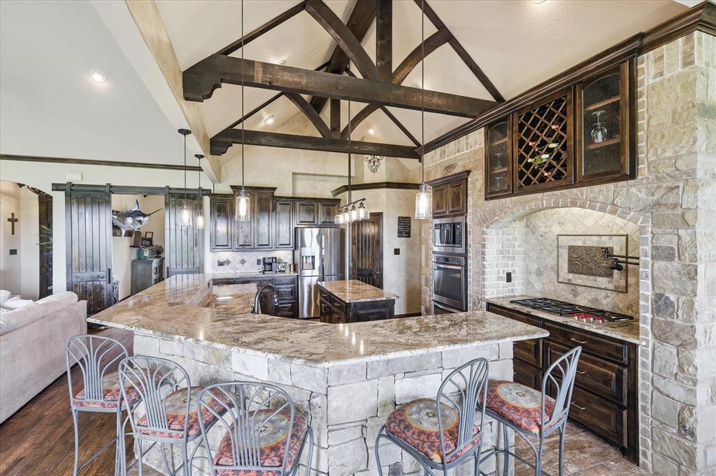 160 Vista Ridge North Decatur, TX 76234 - Photo 13 of 40 a kitchen with a table and chairs
