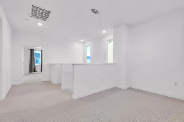 en empty room with windows