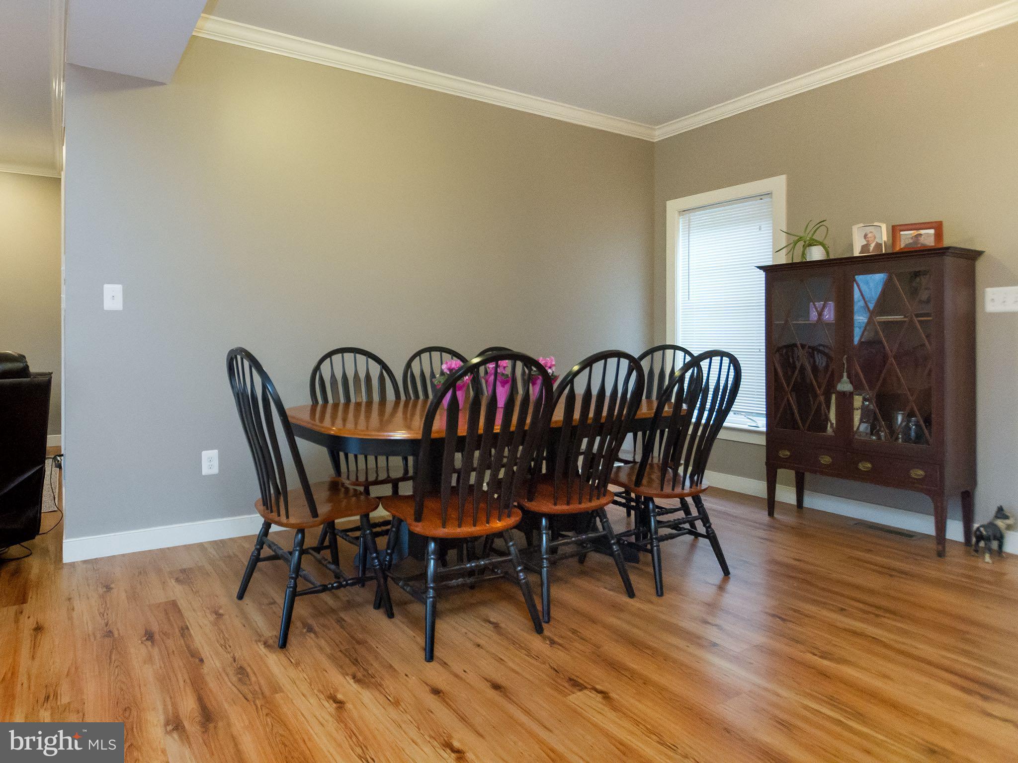 535 Monkton Road Monkton, MD 21111 - Photo 14 of 30 a view of a dining room with furniture and wooden floor