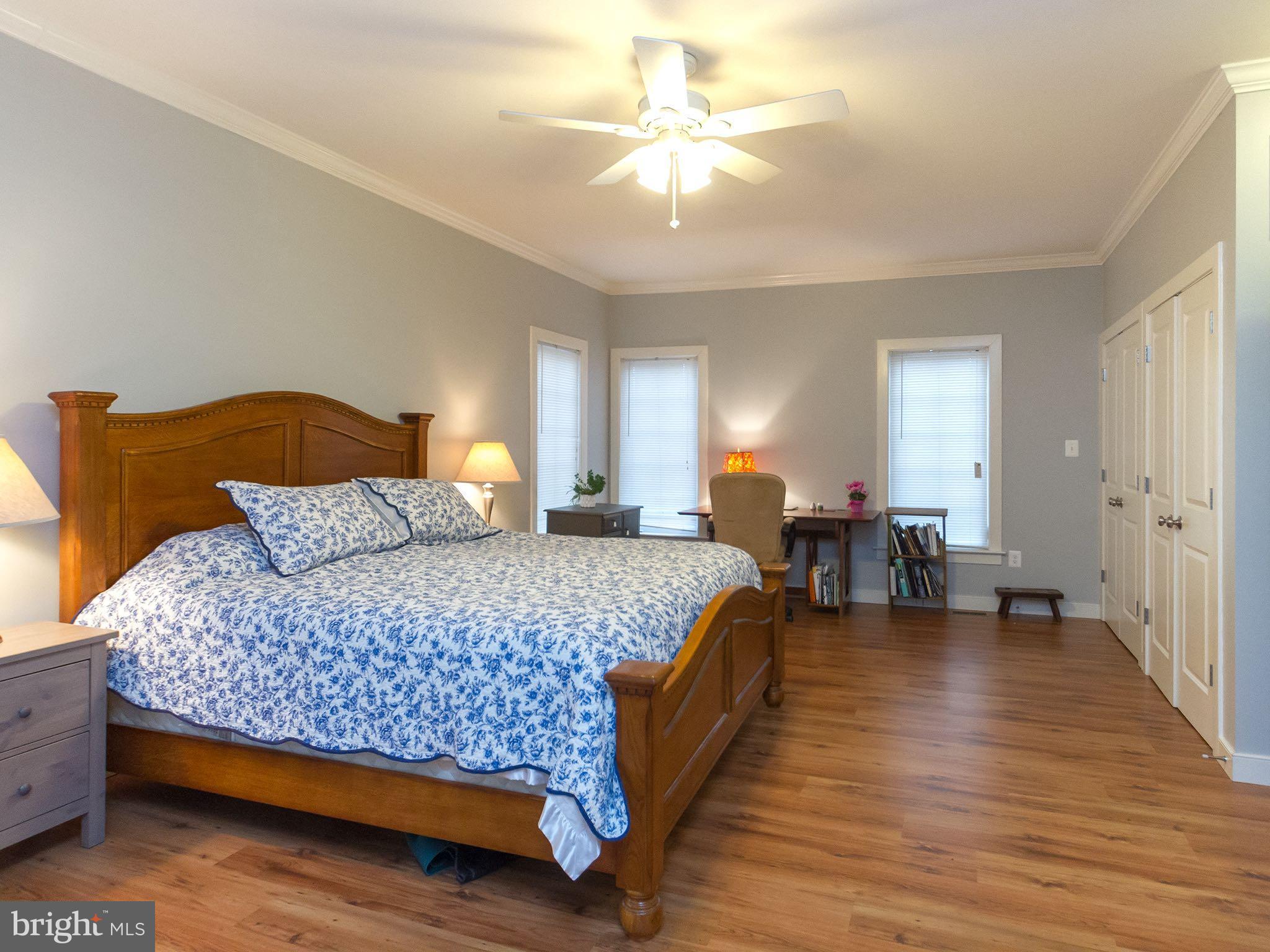 535 Monkton Road Monkton, MD 21111 - Photo 15 of 30 a bedroom with a bed and wooden floor