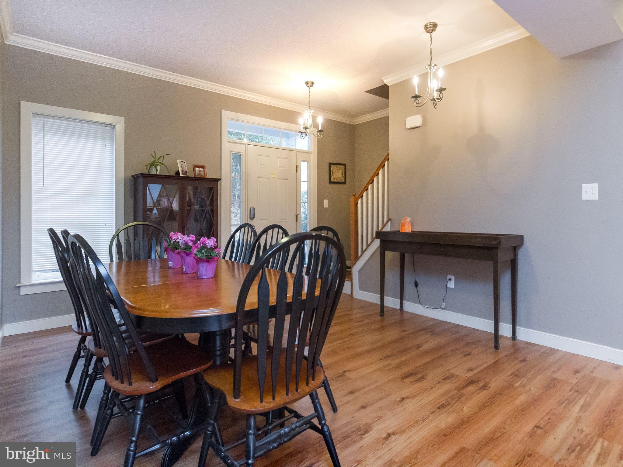 535 Monkton Road Monkton, MD 21111 - Photo 3 of 30 a view of a dining room with furniture and wooden floor