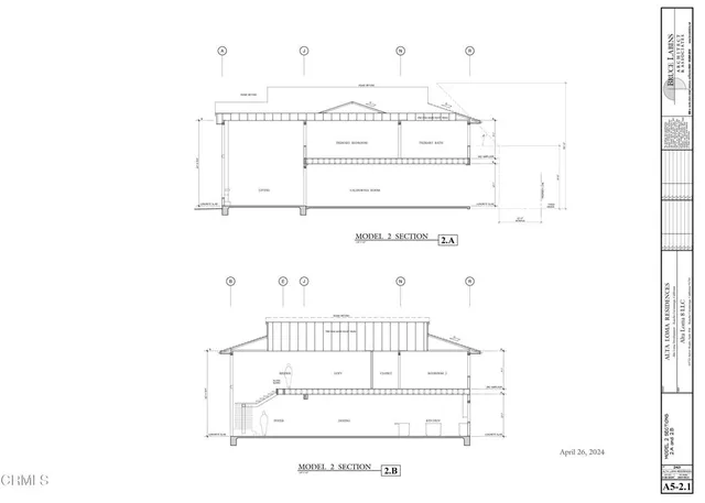 a black white and white photo of a white building