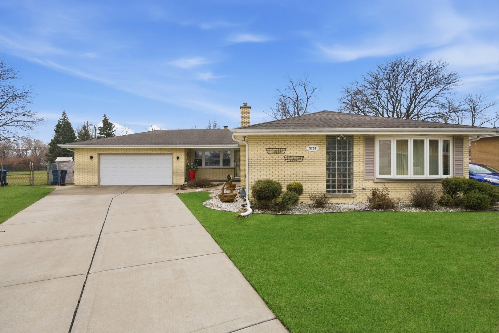 5709 Rose Court Berkeley, IL 60163 - Photo 2 of 2 front view of a house with a yard
