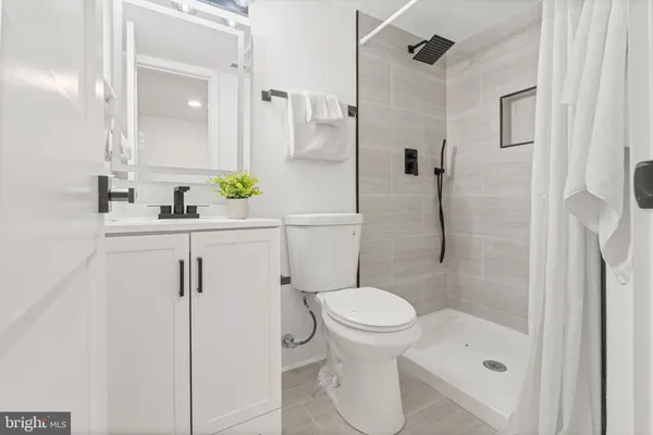 a close view of a utility room with washer and dryer