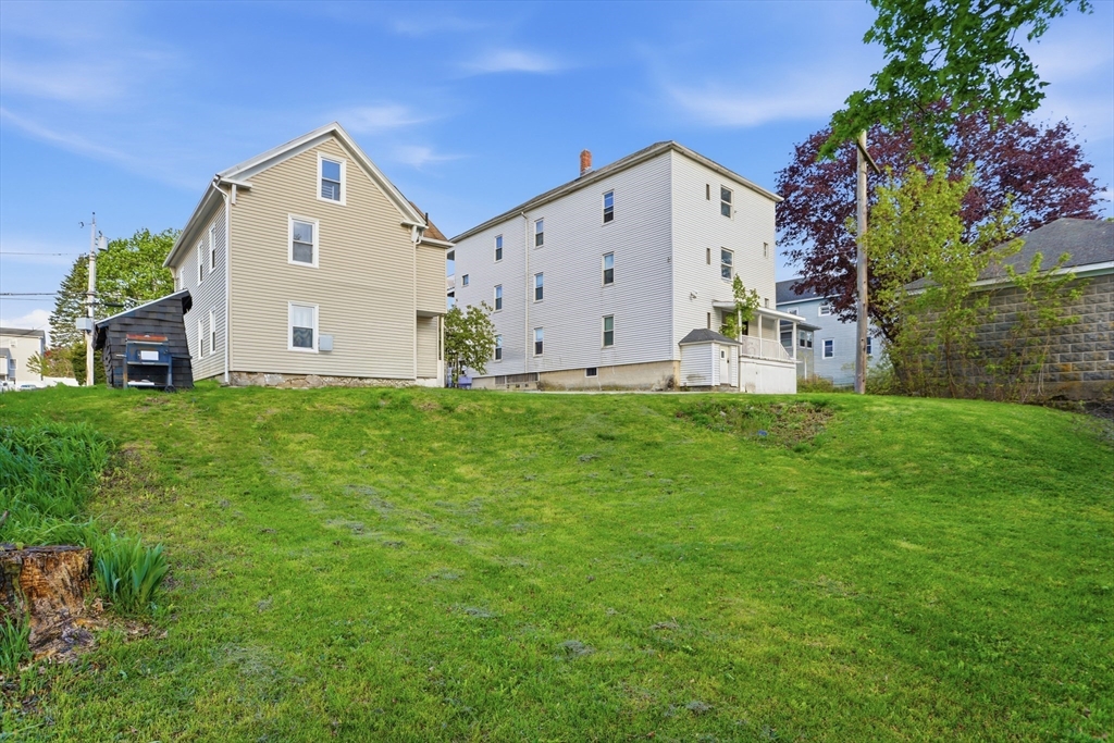 12 Whitcomb Street Webster, MA 01570 - Photo 39 of 40 a view of a house with a yard
