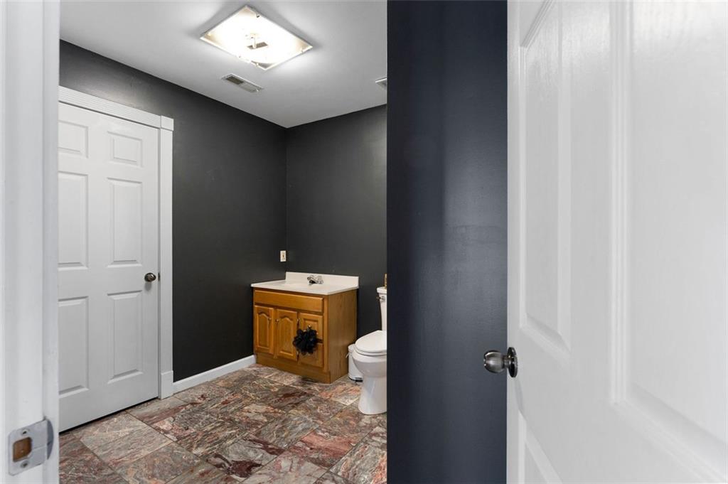 1211 Bellview Road Rockmart, GA 30153 - Photo 29 of 42 a bathroom with a toilet