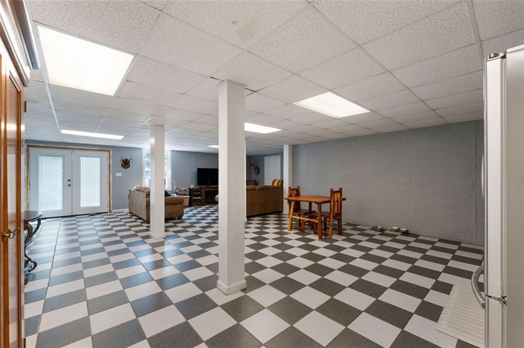 1211 Bellview Road Rockmart, GA 30153 - Photo 33 of 42 a view of a hall with a dining table and chair