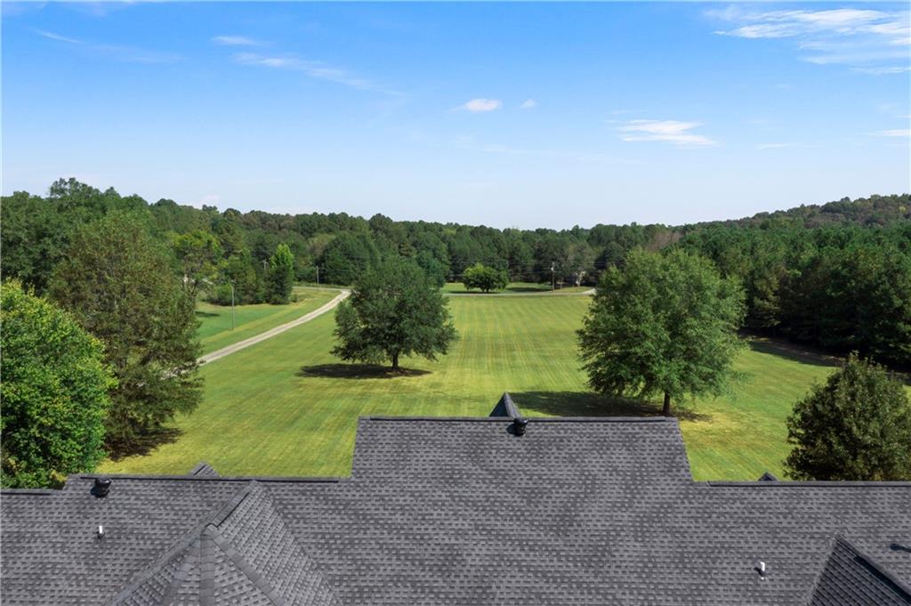1211 Bellview Road Rockmart, GA 30153 - Photo 40 of 42 a view of a lake with a yard