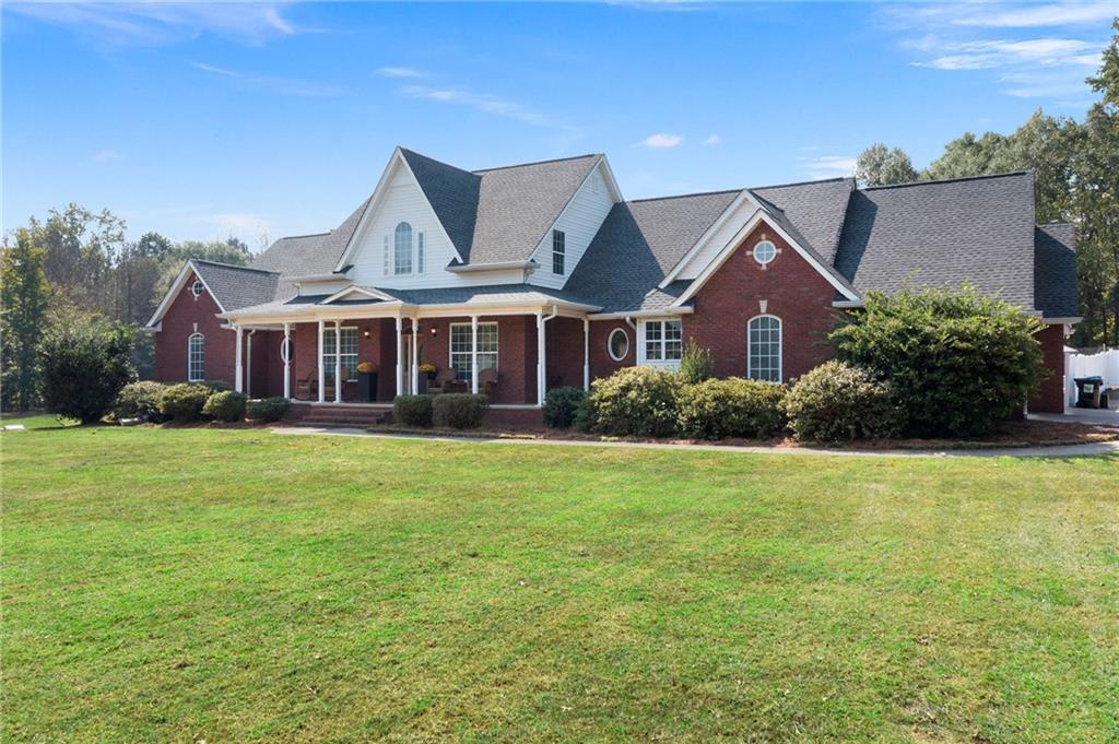 1211 Bellview Road Rockmart, GA 30153 - Photo 4 of 42 a front view of house with yard and porch