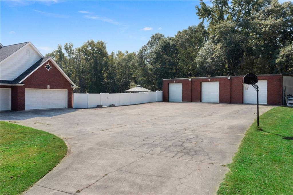 1211 Bellview Road Rockmart, GA 30153 - Photo 41 of 42 a house with yard in front of it