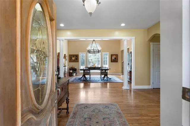 a view of living room with furniture and a large window