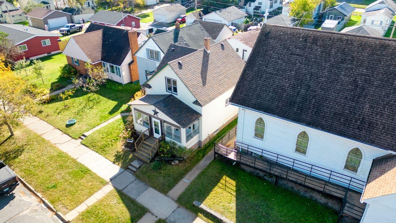 25 3rd Street Southwest Chisholm, MN 55719 - Photo 33 of 44 Aerial perspective of suburban area